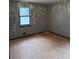 Bedroom shows natural light and a blank canvas for personalization at 285 Woodland St, Dallas, GA 30157