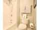 Cozy bathroom with a tub, shower, and toilet; decorated with tasteful artwork at 318 Ivy Manor Nw Dr, Marietta, GA 30064