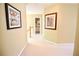 Upstairs hallway with artwork and a view to a bathroom at 318 Ivy Manor Nw Dr, Marietta, GA 30064