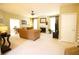 Bright living room featuring a fireplace, ample seating, and neutral decor at 318 Ivy Manor Nw Dr, Marietta, GA 30064