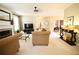 Inviting living room with neutral tones, fireplace, and comfortable seating arrangement at 318 Ivy Manor Nw Dr, Marietta, GA 30064