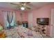 Whimsical bedroom featuring a playful theme and abundant natural light at 78 N Pomona Rd, Hampton, GA 30228