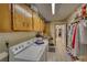 Functional laundry room with ample cabinet storage and space for washer and dryer at 78 N Pomona Rd, Hampton, GA 30228