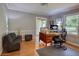 Functional office featuring hardwood floors, a neutral color scheme, and natural light, ideal for remote work at 78 N Pomona Rd, Hampton, GA 30228