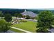 Resort-style clubhouse with fountains, lush landscaping, and a serene atmosphere for residents to enjoy at 1420 Baygreen Rd, Suwanee, GA 30024
