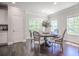 Inviting dining area with large windows and stylish table setting at 1420 Baygreen Rd, Suwanee, GA 30024