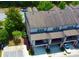 This stylish townhome offers a private balcony, attached garage, and beautifully maintained landscaping at 1420 Baygreen Rd, Suwanee, GA 30024