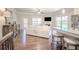 Open living space features hardwood floors, fireplace, and lots of natural light at 1420 Baygreen Rd, Suwanee, GA 30024