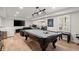 The basement includes a pool table, recessed lighting, and an entertainment area at 220 Riverview Trl, Roswell, GA 30075