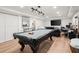 Spacious basement features a stylish pool table, entertainment area, and neutral decor at 220 Riverview Trl, Roswell, GA 30075