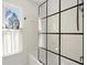 Bright bathroom with a shower/tub combination, subway tile, and a window at 220 Riverview Trl, Roswell, GA 30075