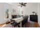 The dining room is equipped with an ornate rug, and a fireplace at 220 Riverview Trl, Roswell, GA 30075