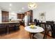 Charming kitchen area featuring a dining table and an open layout perfect for modern living at 220 Riverview Trl, Roswell, GA 30075
