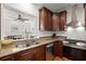 Well-equipped kitchen featuring granite countertops, stainless steel appliances, and ample cabinet space at 220 Riverview Trl, Roswell, GA 30075