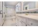 Bathroom featuring a white vanity with mirror, toilet and shower over tub at 2209 Willoby Ct, Morrow, GA 30260