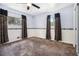 Cozy bedroom with neutral carpet, decorative accents, and ample natural light at 2209 Willoby Ct, Morrow, GA 30260