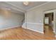 Elegant foyer with hardwood floors, decorative trim, and a staircase at 2477 Lakebrooke Dr, Marietta, GA 30066