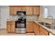 Kitchen featuring stainless steel appliances, granite counters and hardwood flooring at 2477 Lakebrooke Dr, Marietta, GA 30066