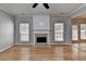 Bright living room with hardwood floors, fireplace, and windows at 2477 Lakebrooke Dr, Marietta, GA 30066