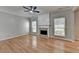 Cozy living room featuring a fireplace, hardwood floors, and neutral paint at 2477 Lakebrooke Dr, Marietta, GA 30066
