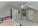 Charming bedroom with a playful design, featuring a book shelf and ample closet space at 440 S Alexander St, Buford, GA 30518
