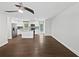 Spacious kitchen and dining area with white cabinets, stainless steel appliances, and hardwood floors at 1886 Akron Se Dr, Atlanta, GA 30315