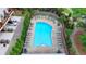 An overhead shot of the community pool surrounded by chairs and landscaping at 221 Thompson St, Alpharetta, GA 30009