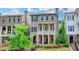 Charming two-story home with stone accents and a welcoming front porch, nestled in a well-maintained community at 221 Thompson St, Alpharetta, GA 30009