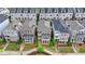 This aerial view showcases the townhome exteriors and landscaping at 221 Thompson St, Alpharetta, GA 30009