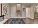 Elegant foyer with hardwood floors, leading to the staircase and offering a glimpse of the well-appointed interior at 221 Thompson St, Alpharetta, GA 30009