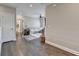 Spacious hallway leading into the open concept living room area with tile floors at 221 Thompson St, Alpharetta, GA 30009