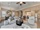 Open-concept living space with stairs, modern kitchen and dining areas offer a seamless and inviting atmosphere at 221 Thompson St, Alpharetta, GA 30009