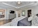 Well-lit main bedroom boasts hardwood flooring, a walk-in closet, and an ensuite bathroom, offering comfort and convenience at 221 Thompson St, Alpharetta, GA 30009