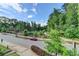 Scenic view of the neighborhood park, with walking trails, a pond, and lush greenery at 221 Thompson St, Alpharetta, GA 30009