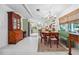 Bright dining area with chandelier and open view to the kitchen, perfect for entertaining at 4442 Mclain Cir, Acworth, GA 30101