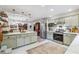 Spacious kitchen features modern appliances, marble countertops, and an island for cooking and entertaining at 4442 Mclain Cir, Acworth, GA 30101