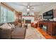 Cozy living room features hardwood floors, fireplace, and natural light at 4442 Mclain Cir, Acworth, GA 30101