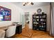 Office features a large bookcase and desk, providing a functional and organized workspace at 692 Brooks Woolsey Rd, Brooks, GA 30205