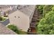 Townhome showing a back deck overlooking a green space, with privacy fences between units at 893 Society Sw Cir, Atlanta, GA 30331