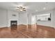 Spacious living room with fireplace, hardwood floors, and an open layout at 893 Society Sw Cir, Atlanta, GA 30331