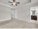 Large main bedroom offers neutral carpet and attached bathroom with dual closets at 893 Society Sw Cir, Atlanta, GA 30331