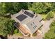 Aerial view of the home showcasing the deck and solar panels on the roof at 186 Mt Calvary Rd, Marietta, GA 30064