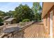 Large deck, great for entertaining, featuring wood flooring, a railing, and views of the well-maintained backyard at 186 Mt Calvary Rd, Marietta, GA 30064