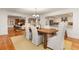 Bright dining room with a large wooden table, ample seating, and access to living spaces at 186 Mt Calvary Rd, Marietta, GA 30064