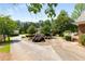 Long driveway leading to the property, showcasing manicured landscaping at 186 Mt Calvary Rd, Marietta, GA 30064