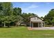 Two-story garage with covered parking, complemented by well-manicured landscaping at 186 Mt Calvary Rd, Marietta, GA 30064