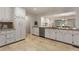 Well-lit kitchen featuring granite counters, stainless appliances, and ample white cabinet storage at 186 Mt Calvary Rd, Marietta, GA 30064