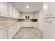 Spacious kitchen with white cabinets, long countertops, and abundant storage space at 186 Mt Calvary Rd, Marietta, GA 30064