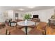 Open living area includes a table, seating area, and bar, great for entertaining at 186 Mt Calvary Rd, Marietta, GA 30064