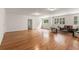 Spacious living area with hardwood floors, large windows and comfortable seating for relaxing at 186 Mt Calvary Rd, Marietta, GA 30064